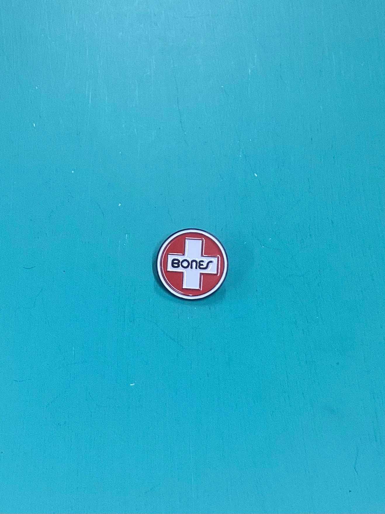 Bones Swiss Circle Enamel Pin